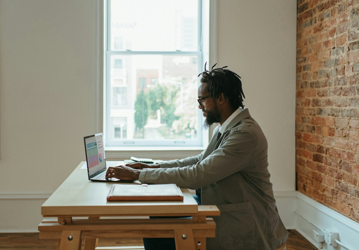 Houston business owner reviewing on-page SEO optimization results with SEO team