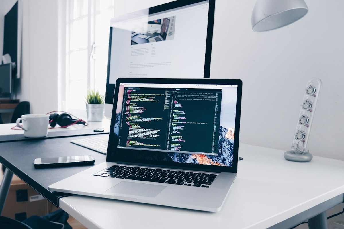 Houston Mobile App Development — developer writing iOS and Android app code for Houston businesses